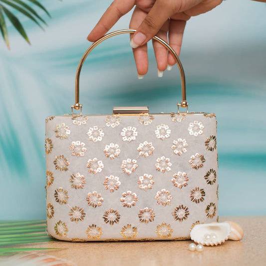 White flower handle clutch