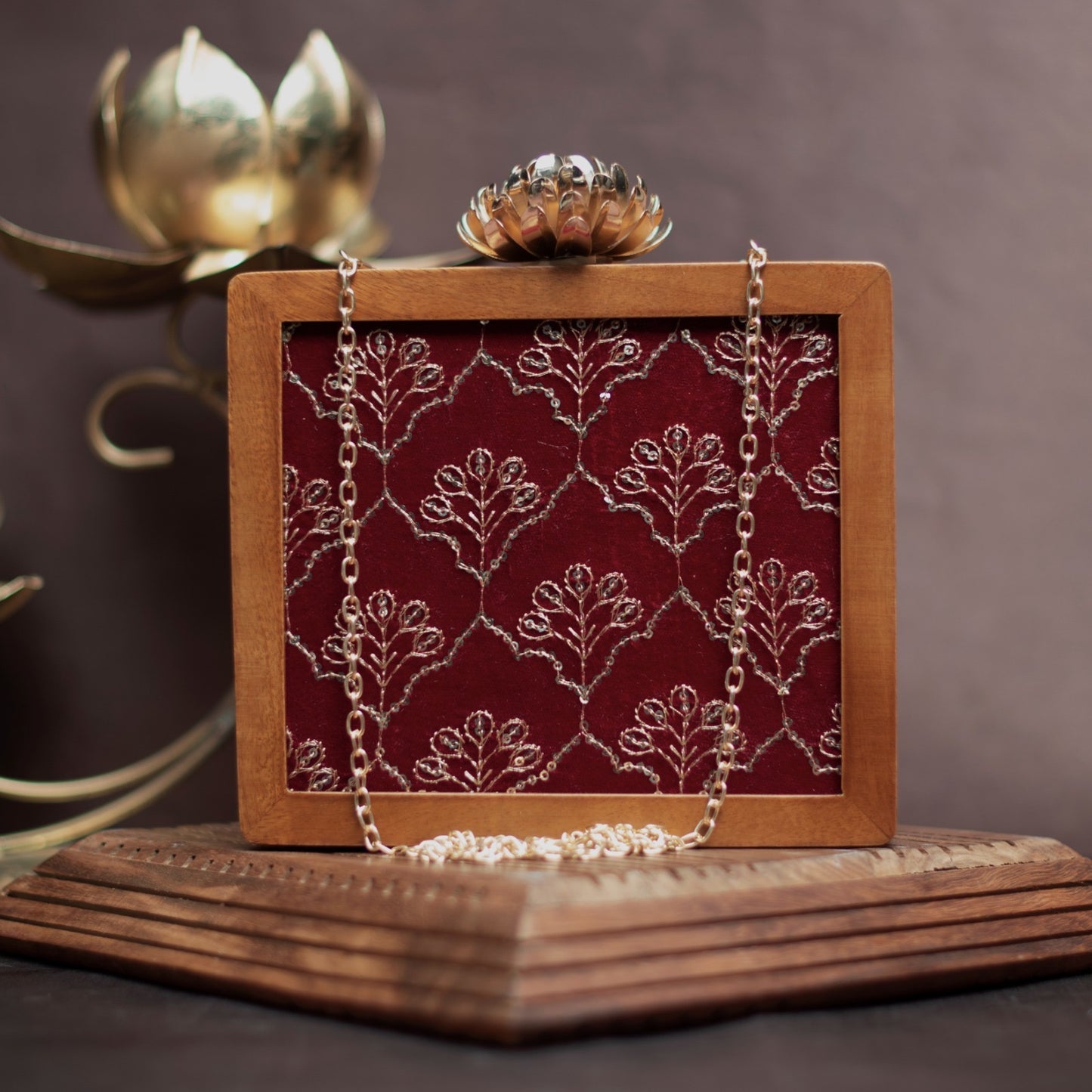 Embroidered wooden clutch