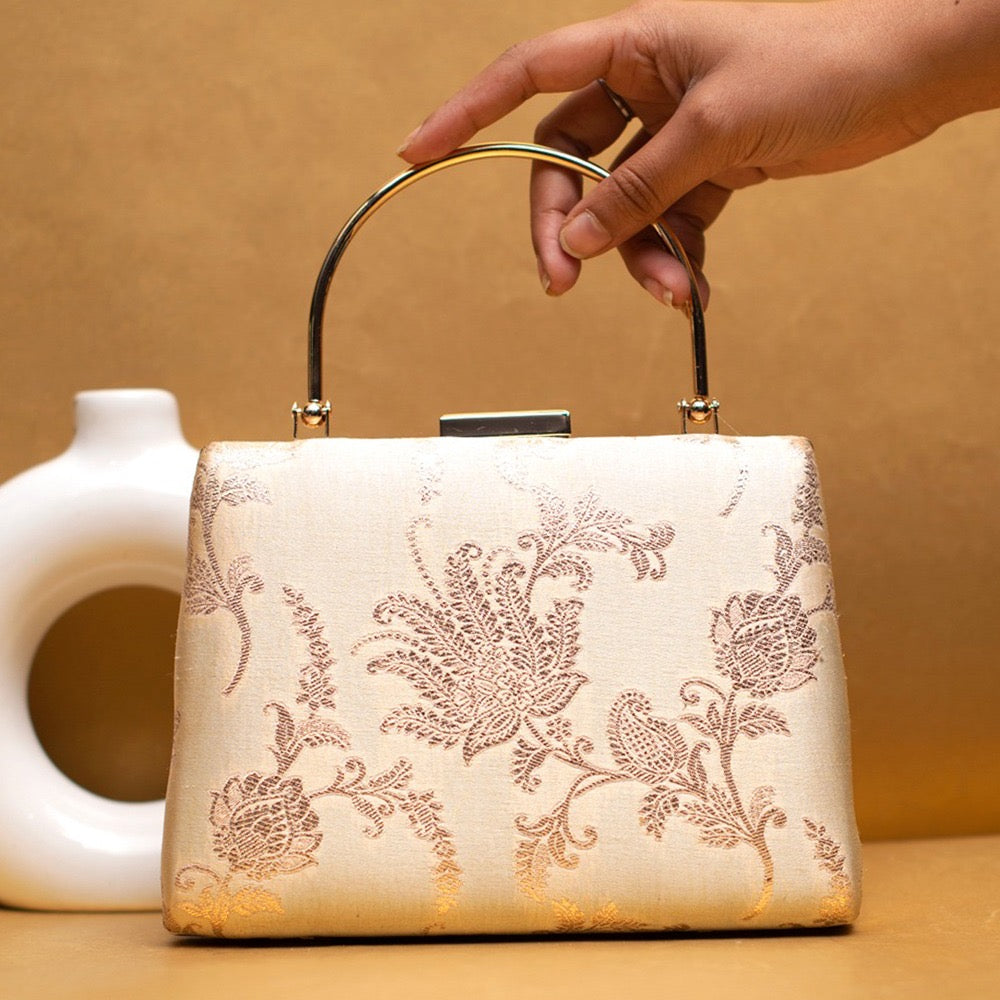 Cream Flower handle clutch