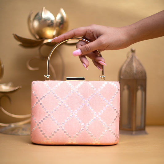 Peach diamond handle clutch